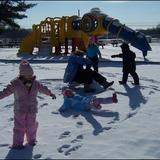 Bethany Christian School Photo - Making Snow Angels...outdoor play is an important part of our program.