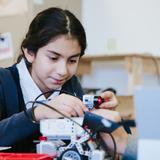 Harrisburg Academy Photo #3 - Our Middle School students focus on programming their robots!
