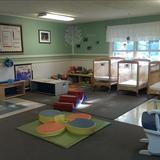 Kindercare Learning Center 868 Photo #4 - Our older infant classroom is for our mobile infants. This larger, least restrictive room allows our older infants the freedom to move every part of their body, whenever he/she desires, as he works towards all those critical milestones. Our teachers work with the older infants on crawling, standing, walking, etc. They sing, read, and constantly talk to their babies.