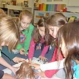 Montessori Children's Community Photo #2 - As a community, the students collaborate within the classroom to problem solve.