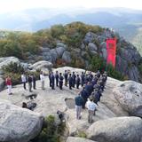 St. Louis De Montfort Academy Photo #1 - Students sing the Apostles Creed from the top of Old Rag Mountain in Virginia after a strenuous hike.