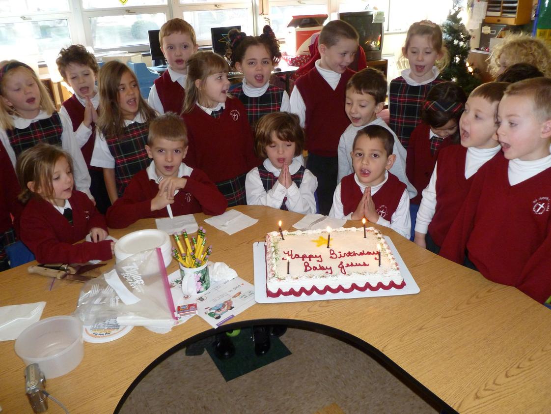 St. Rose Of Lima School Photo - The St. Rose of Lima School Kindergarten celebrated the birthday of baby Jesus with a special cake and song.