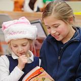 Wyoming Seminary Lower School Photo #6 - Older students are paired with younger students in our literacy programs, fostering a sense of community and giving the students an opportunity to enjoy success with their peers.