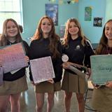 Charleston Christian School Photo #14 - Middle school science Excited 8th graders proudly display their newly created science folders on the first day of school. At CCS, we inspire curiosity and a love for learning, providing hands-on, engaging science lessons that encourage students to explore, think critically, and prepare for success in high school and beyond.