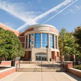 McCallie School Photo - The 180,000 square-foot Sports & Activities Center is home to five basketball courts, a racquetball court, a climbing gym, a weight room, a 25yd x 25m swimming pool, a wrestling room, twenty-five indoor rowing machines, an indoor track, and a full-service athletic training room. The building also houses a student recreation area with ping-pong tables, pool tables, and an arcade.