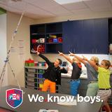 Presbyterian Day School Photo #7 - Boys love to compete and problem-solve. Today, 4th graders worked in teams to build the tallest tower from paper and tape.
