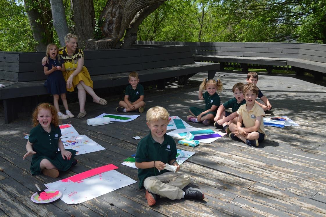 Sumner Academy Photo #1 - Pre-kindergartners enjoy art class in our outdoor classroom, a great place for art and other activities for students of all ages.