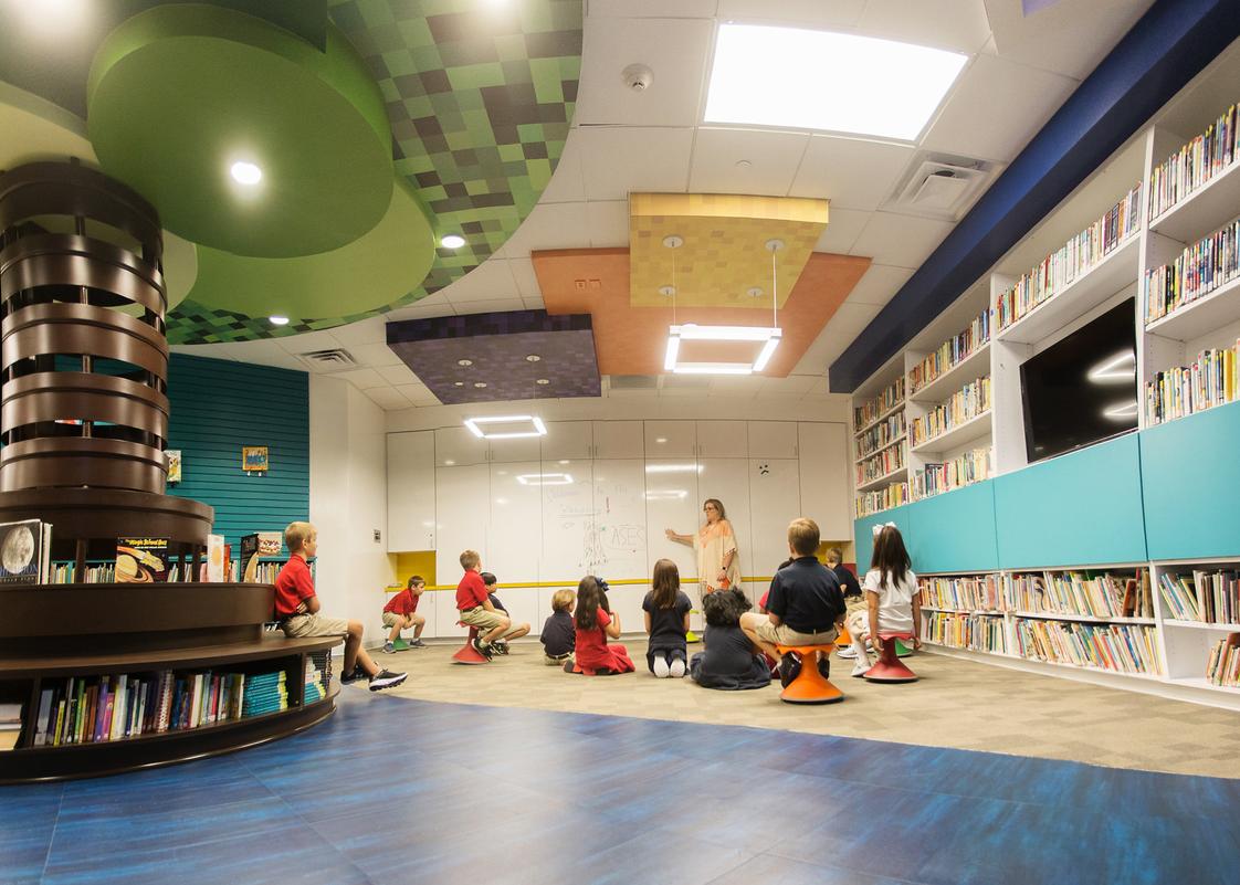 All Saints Episcopal School Photo #1 - Th Collaboratory is a high-tech, adaptive learning space with modular furniture, bright colors, a reading tree and reading nooks where students feel comfortable and are engaged to learn.