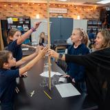 Liberty Christian School Photo #5 - Lower School students try to build a tower as high as possible with everyday items in the STEM GRID Lab.