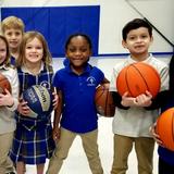 Shepherd Of The Hills Lutheran School Photo - First graders show off their basketball skills in PE.