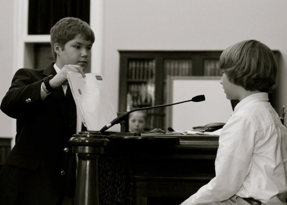 Thaddeus Stevens School Photo #1 - Student presents the witness with evidence at the annual mock trial held at Caledonia Courthouse.