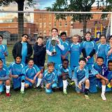 St. Thomas Aquinas Regional School Photo #2 - Aquinas boys' soccer team celebrating their championship win.