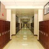 Catholic High School Photo #4 - Hallway: Our hallways are busy and bustling as students navigate their classes, say hello to friends and visit their lockers. Special occasions, including Homecoming, game days and even birthdays, offer opportunities to decorate their class halls.