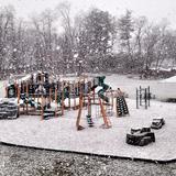 Montessori School Of Mclean Photo #3 - Rear View of the main Playground on a snowy day