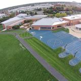 The Nysmith School Photo #4 - Our 13.25 acre campus includes four soccer fields, eight basketball courts, three playgrounds, a 1/4 mile track, and a modern school building with 75,000 square feet of indoor space. We've created a stimulating learning environment that is welcoming, cheerful, supportive, and energizing.