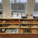 Arlington Montessori House Photo #3 - Practical life shelves located in the prepared environment.