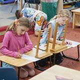 Cascadia School Photo - Using the beautiful Montessori math materials to work on operations. Cascadia School Photo - Using the beautiful Montessori math materials to work on operations.