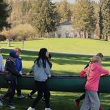 Saint George's School Photo #10 - Lower School students practice portaging a canoe around campus trees and down to the Little Spokane River, that flows right past Saint George's campus.