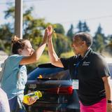 UPrep Photo #3 - UPrep Head of School Ronnie Codrington-Cazeau greets a student as they arrive on campus for school.