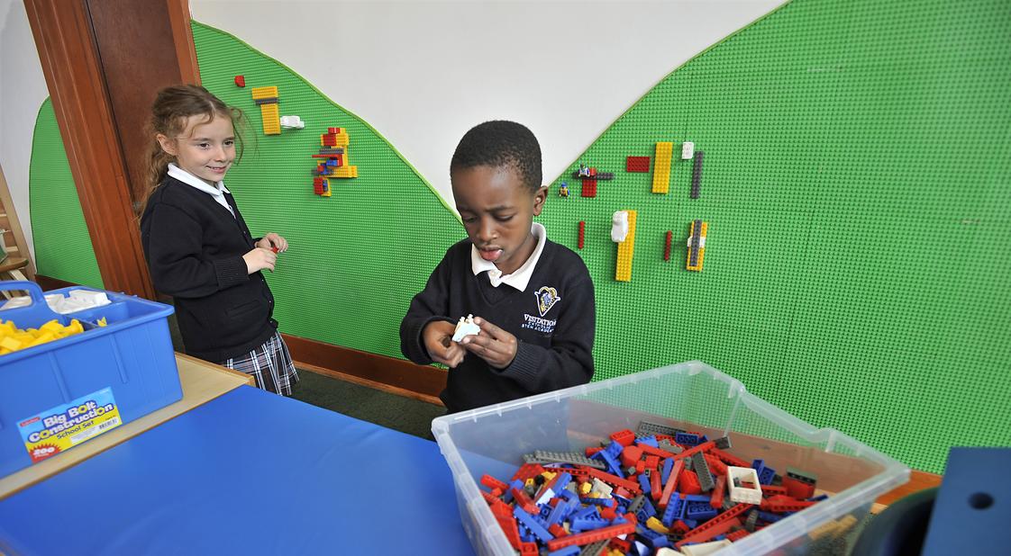 Visitation Catholic Stem Academy Photo - Learning about patterns on the Lego wall.