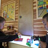 Visitation Catholic Stem Academy Photo #6 - Students learn geometry skills with shapes on the light table.