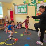 OC Kids Infant & Preschool Photo #9 - Dance and Gymnastics Fun with our 3-4 year old class. Our Dance Enrichment Program is a favorite of our families. Enrichment programs are offered at no extra cost and provided within our classrooms, with supervision from classroom teachers, and guidance from our highly skill instructors.