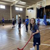 Our Mother Of Good Counsel School Photo - Floor Hockey During PE