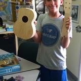 Pacific Academy Photo #9 - In Music Theory I, students sand and decorate their ukuleles. They are building their ukes from scratch, painting them, and will learn to play them in the upcoming weeks.