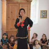Step By Step Montessori School Photo #4 - Miss Marzi giving speech to the audience on April 29. 2016 Cultural event.