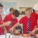 Park Row Christian Academy Photo #3 - With the freedom from state-mandated standardized testing, our students have the freedom to experience fun, interactive lessons and enjoy special programs and presentations. Here our sixth grade students are having an English Tea after studying the Boston Tea Party.