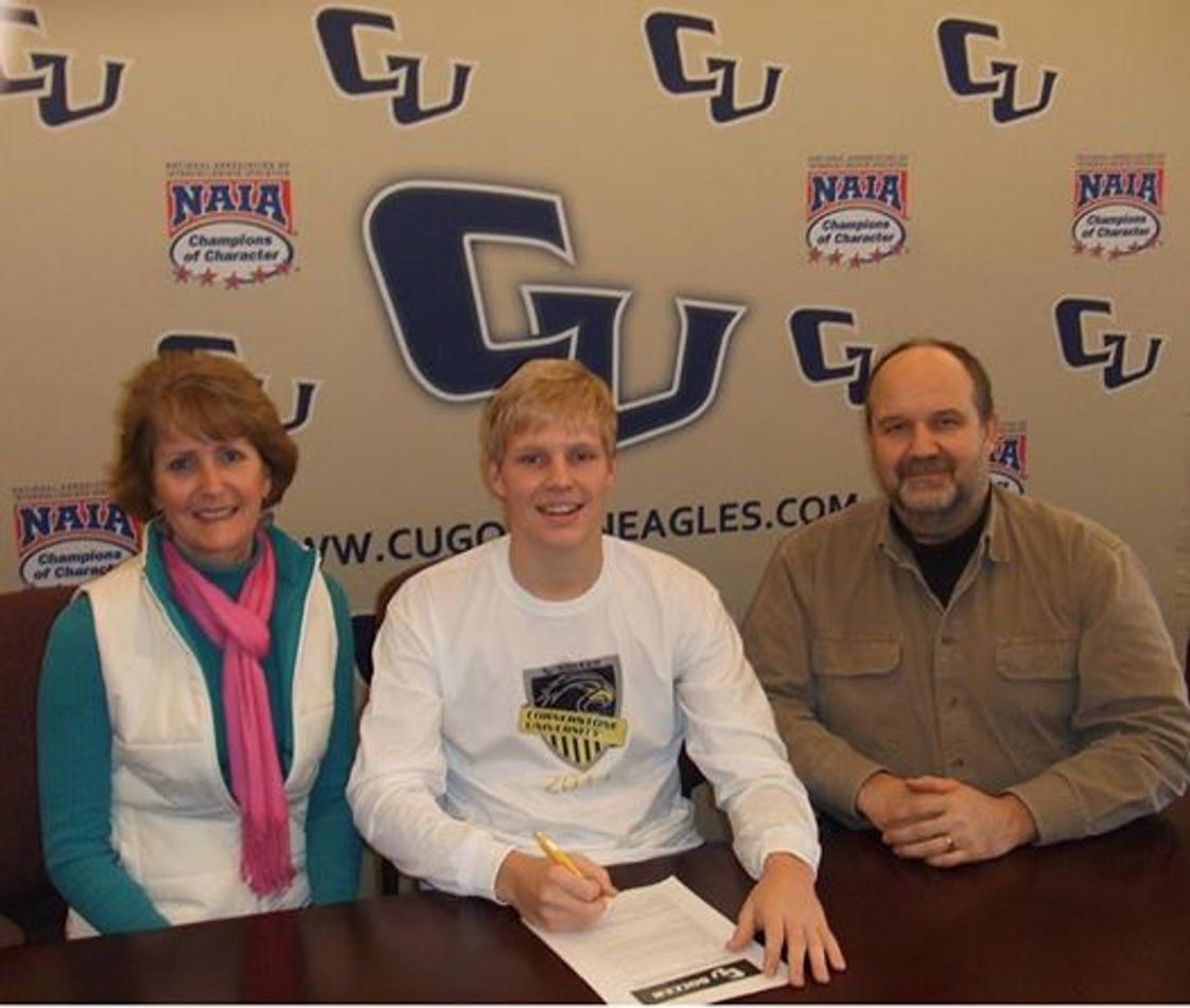 Victory Christian Academy, Inc Photo - Senior Evan Duey signs an athletic scholarship with Cornerstone University!
