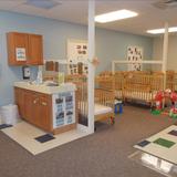 Knowledge Beginnings Photo #5 - Each infant has their own assigned crib and has a warm, inviting environment to learn and make new firends.