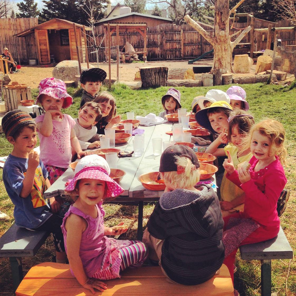Boulder Waldorf Kindergarten Photo - Enjoying our morning snack on the playground!