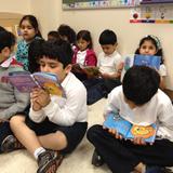 Islamic School Of Greater New Orleans Photo #5 - KG Students using classroom library.