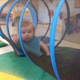 Ries Ballwin KinderCare Photo #7 - The babies love to crawl through the tunnel as they are improving their large moter skills and coordination.