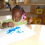 West Schaumburg KinderCare Photo #7 - Our Toddler children develop fine motor skills while painting the weather