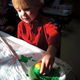 Edwardsville KinderCare Photo #5 - Who needs a paintbrush? This orange works great!