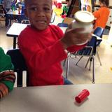 Edwardsville KinderCare Photo #6 - We made cornbread so of course we need some freshly made butter too! Shake it up!
