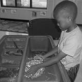 Mary Street KinderCare Photo #6 - Exploring in the sensory table in our pre-kindergarten classroom