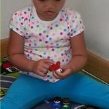 Cooley Street KinderCare Photo #5 - We play focused.Using people toys to act out we see.