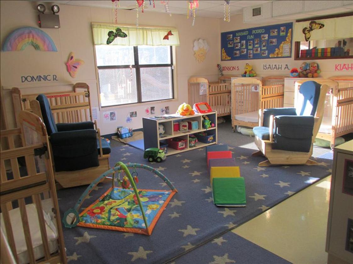 Cascade Park KinderCare Photo #1 - Our infant room is cozy and warm, bright and fun.