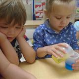 Ormond Beach KinderCare Photo #8 - Twos learning about science by mixing colors