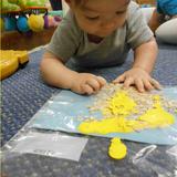 Green Oaks KinderCare Photo - Infants explore sensory bags