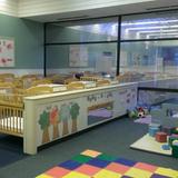 Worthington KinderCare Photo #5 - Our spacious Infant classrooms offer a least restrictive environment where children are free to explore the classroom. The Early Foundations Infant curriculum is designed to promote learning through exploration.
