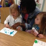 Kirkwood KinderCare Photo #5 - Miss Terra helps the children to recognize the letters in their name in our Preschool class.