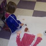 Lexington Knowledge Beginnings Photo #10 - One of our Preschool Classroom students enjoys painting