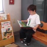 Lone Oak Montessori School Photo #6 - A quiet corner is always available for students to look through a constantly rotating supply of books.