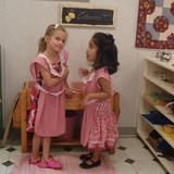 Lone Oak Montessori School Photo #7 - Cloth Washing is a two-person job that promotes team work and practical life skills. Socialization is also an important component of the classroom.