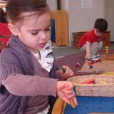 Lone Oak Montessori School Photo #1 - The toddler class focuses on developing concentration and independence.