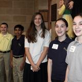 Academy Of Notre Dame Photo #6 - Lower School students greet attendees at an Open House.